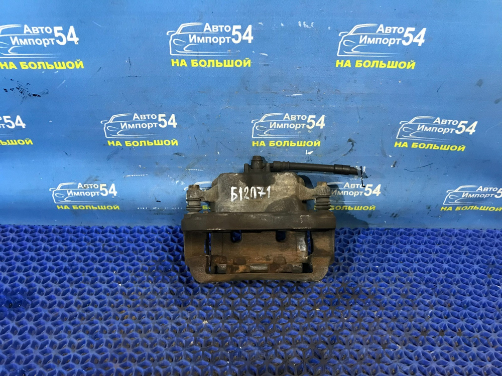 Суппорт тормозной передний левый NISSAN ELGRAND 1997-2002