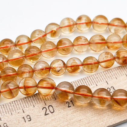 "Цитрин" бусины (кварц), диаметр около 8,4-8,6 мм, цена за 11 шт (1/4 нити)