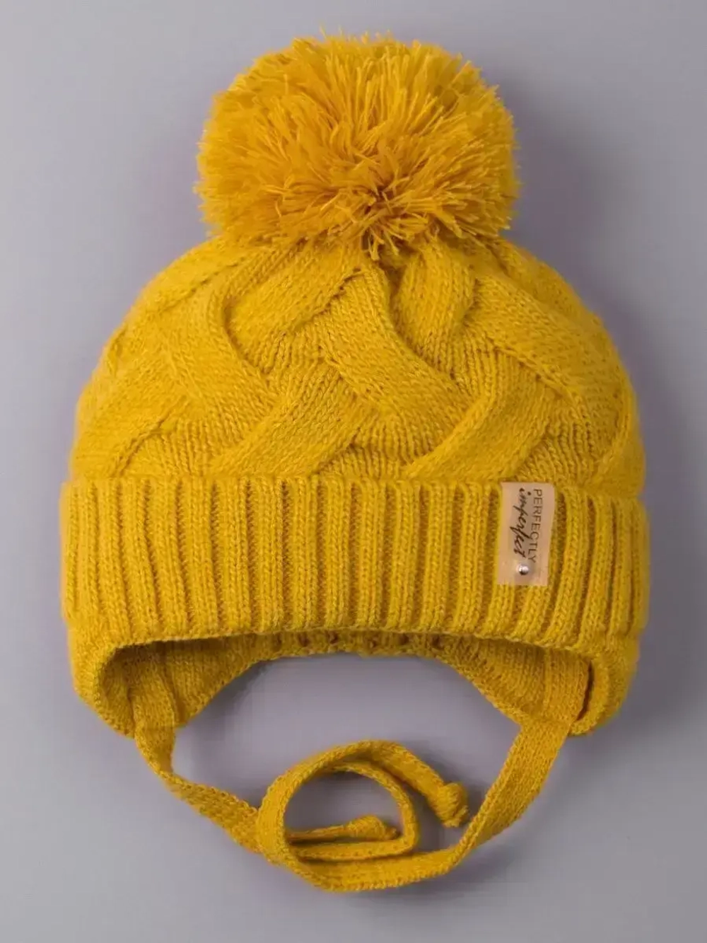 Шапка вязаная демисезонная на завязках для детей