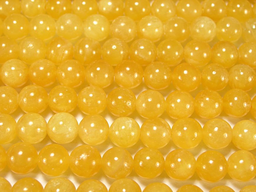 Нити бусин из кальцита желтого, шар гладкий 10мм (оптом)