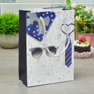 Пакет бумажный 14*20*7см с ручками, с тиснением "Мужской" микс 49