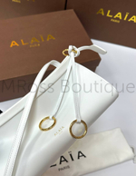 Женская сумка Alaia Le Click East West белого цвета