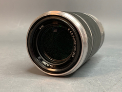 Sony 55-210mm f/4.5-6.3 E OSS внутри налет в виде точек