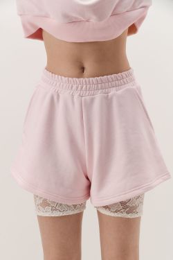 Шорты из футера укороченные сбоку нежно-розового цвета