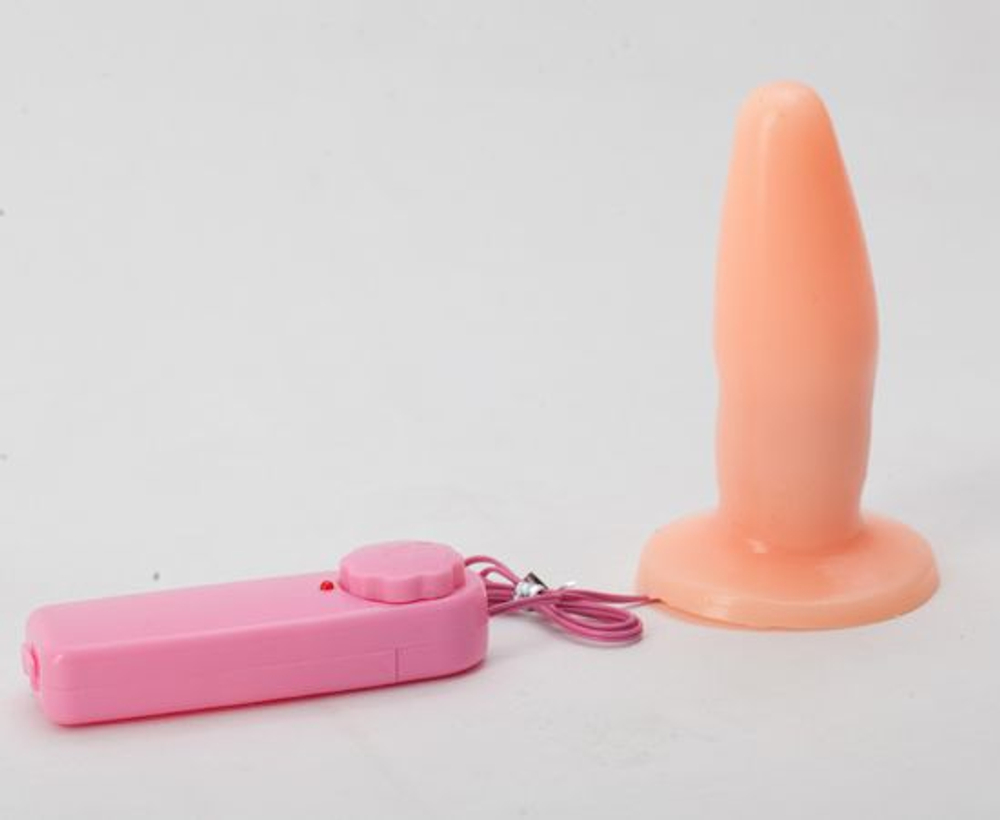 Телесная анальная пробка с вибрацией и ограничительным основанием - 12 см. (Цвет: телесный)