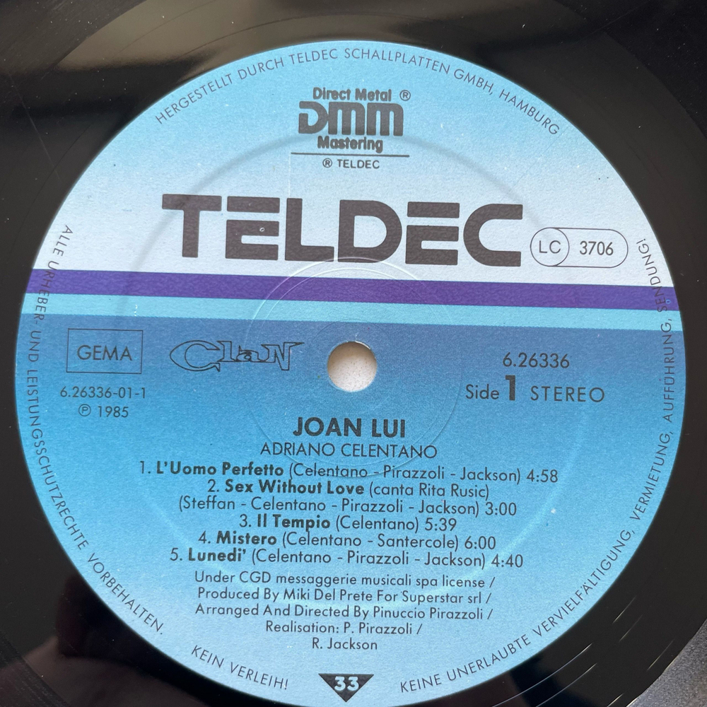 Винтажная виниловая пластинка LP Adriano Celentano Адриано Челентано, Joan Lui (Soundtrack) Музыка Из Кинофильма Джоан Луй (Германия 1985)