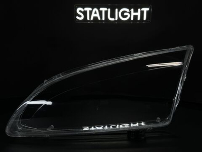 Левое стекло фары Ford Focus 2 2004-2008 дорестайлинг