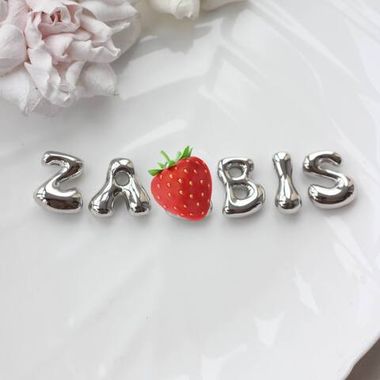 Слово из букв ZAEBIS в серебре
