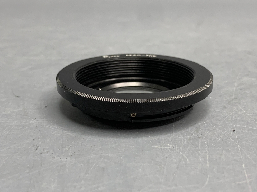 Переходник (адаптер) М42 - Nikon с линзой