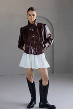 Бомбер из эко-кожи с драпировкой бордовый