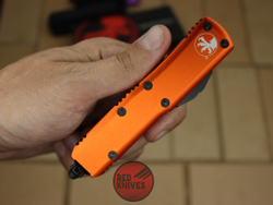 Нож Microtech UTX-85 S/E - оранжевая рукоять, стандартный клинок, черный + запчасти RK-395