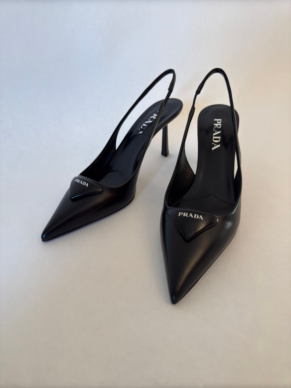 Слингбэки Prada