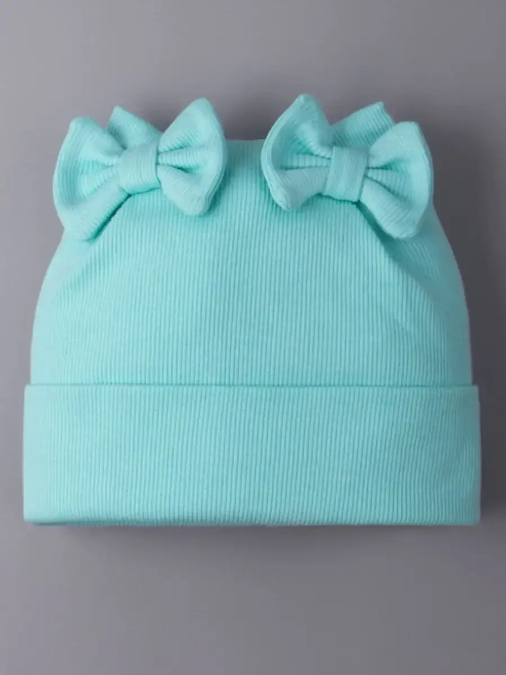 Шапка для девочки осенняя с бантиками