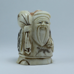 Нэцкэ Фукурокудзю с мешком риса и персиком