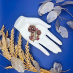 Брошь "Цветочная фантазия" из цинкового сплава и горного хрусталя.