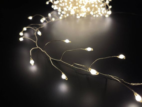 Светодиодная нить Капли 600 белых ламп, 15 м., 24В, серебряный провод, LUCA (84912)