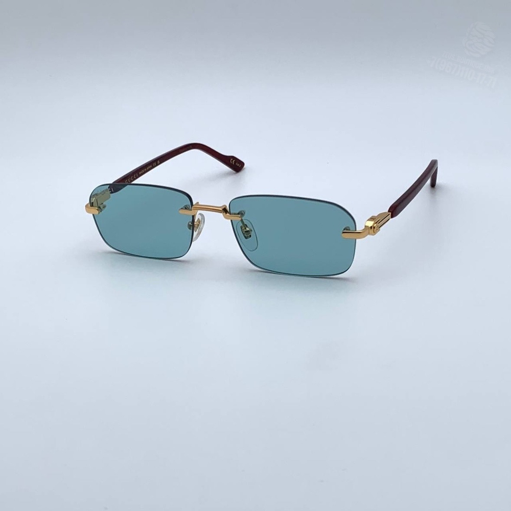Солнцезащитные очки Gucci