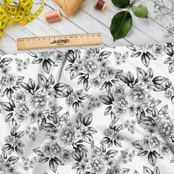 Ткань кулирная гладь черно-белые бутоны цветов