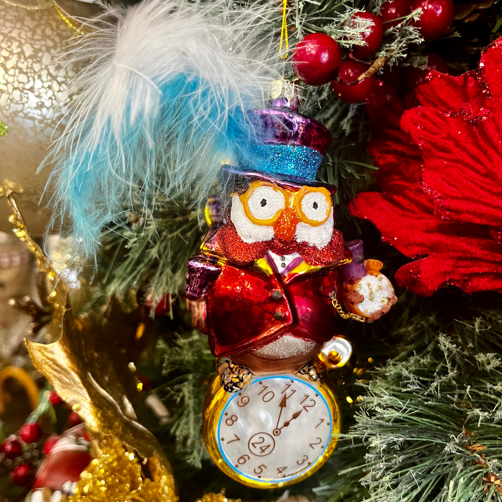 Сова в стразах с пером