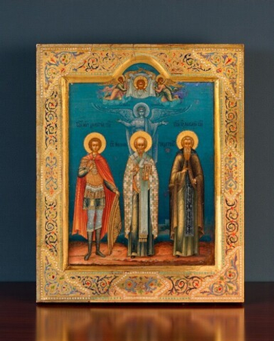 Дмитрий Солунский, Николай Чудотворец и Макарий Калязинский с Ангелом Хранителем перед иконой Спаса Нерукотворного. Деревянная икона на левкасе