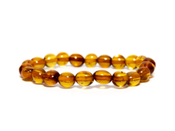 Детский браслет из цельного янтаря "Морская галька". Браслет для детей из натуральных камней