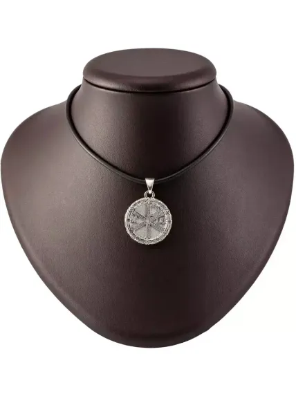 Изображение на коричневом постаменте оксидированной подвески Хризма из серебра 925 пробы.