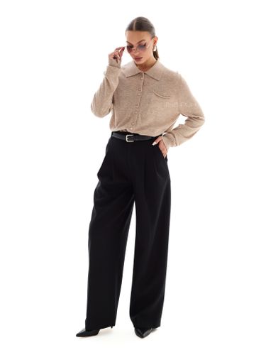 Трикотажная бежевая рубашка с нагрудным карманом