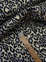 Жаккард шелк с п/э и люрексом Gucci золотой с черно-белым анималистичным принтом