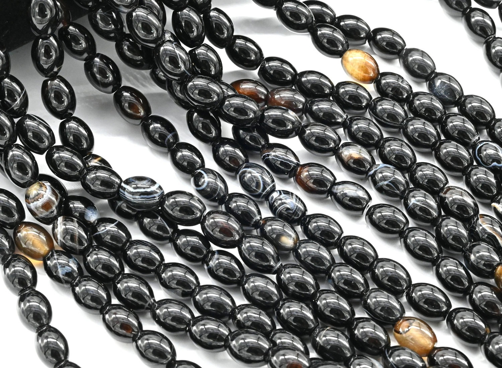 43164 Агат глазковый рис 11*8мм, нить 19см