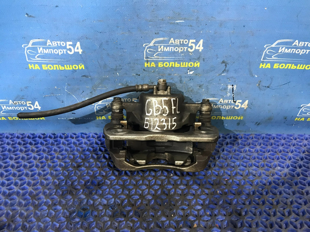 Суппорт тормозной передний левый Honda FREED 2016-2024