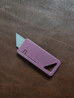 Нож для сменных трапециевидных лезвий.