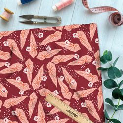 Ткань дюспо коралловый лотос на красном фоне