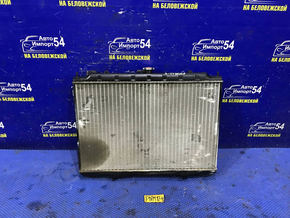 Радиатор двигателя NISSAN LIBERTY 1998