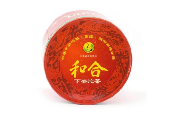 Sheng puer 2006 &quot;Harmony&quot; brand &quot;Pine and Crane&quot; factory &quot;Xiaguan&quot; nest 125 g