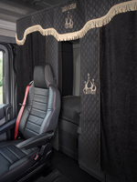 Шторы спального места с ламбрекеном в кабину грузовика. Ламбрекен из экокожи с вышивкой Спаси и Сохрани. Блэкаут, велюр. Черный цвет с вставкой из экокожи и вышивкой. Высота 1,35м, ширина одной стороны - 1,05м.