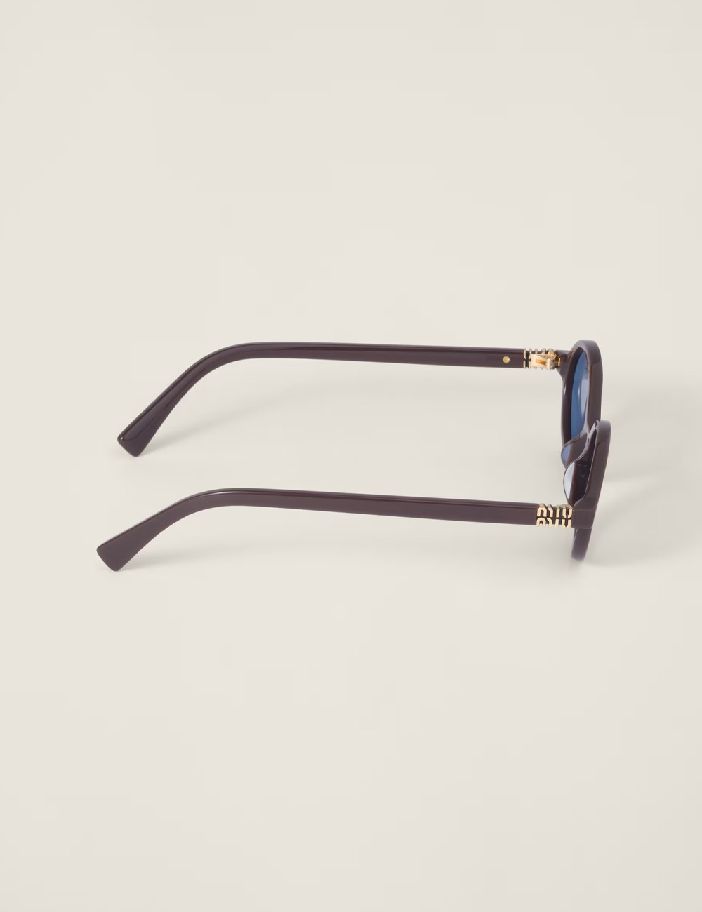 Солнцезащитные очки Miu Miu Regard Indigo lenses