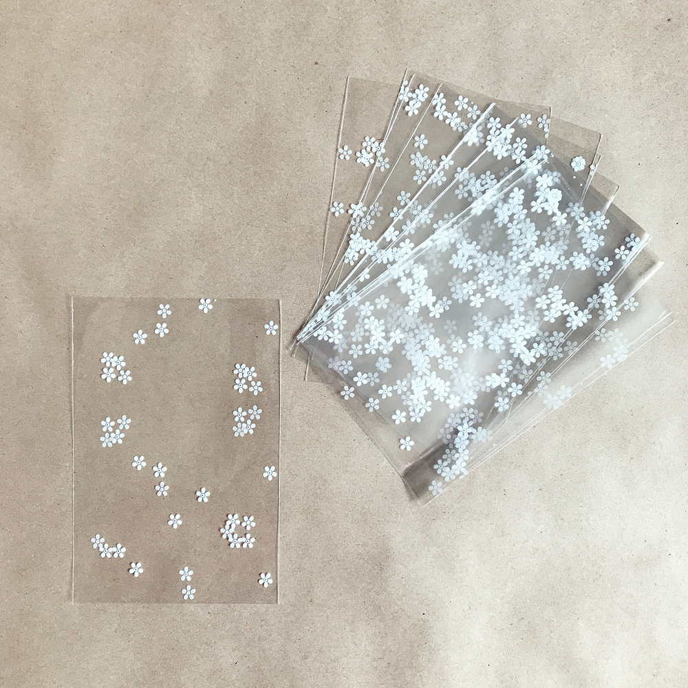 Прозрачный пакет 10х15 см (белые цветы), 100 шт