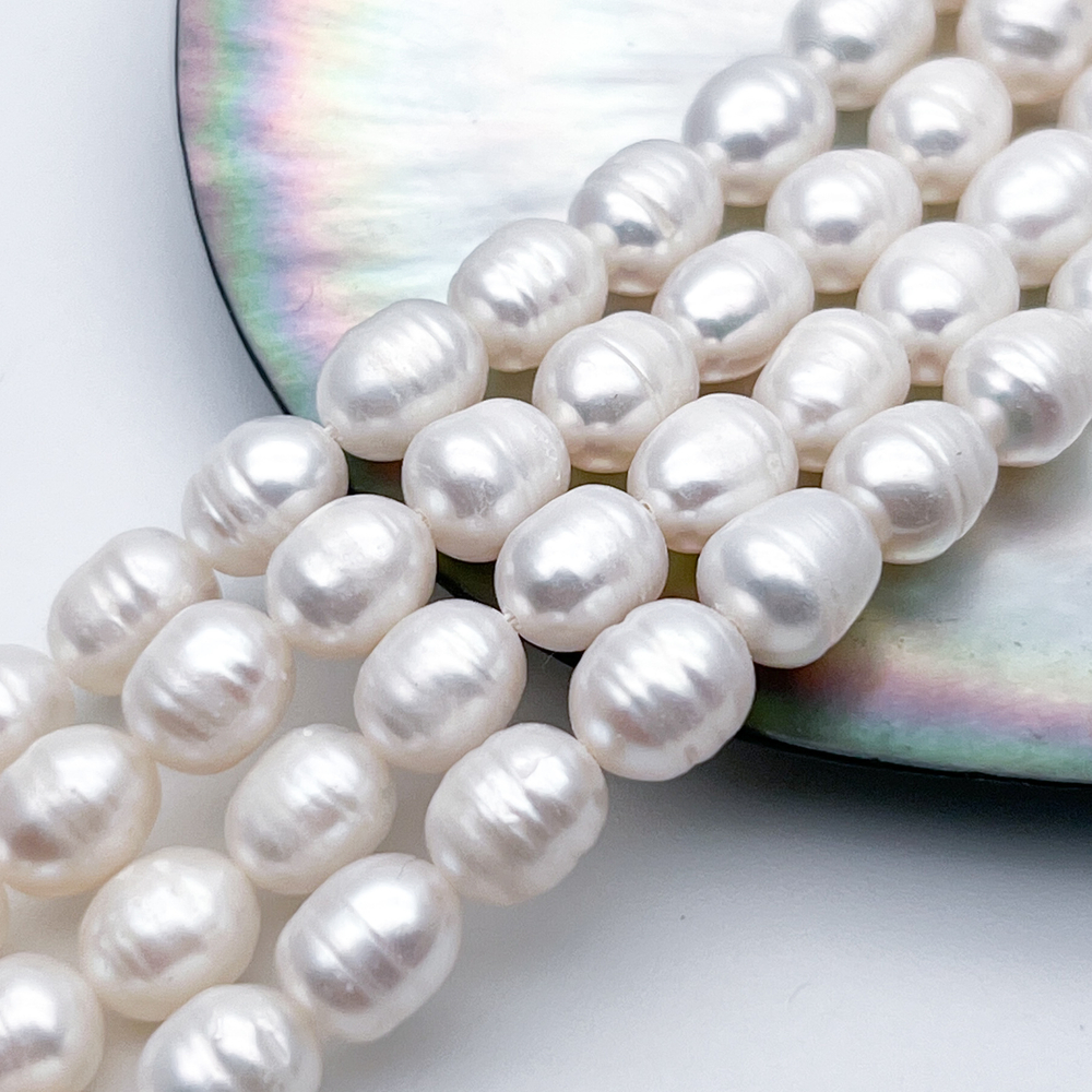 Жемчуг, размер около 7-8*6,5-7 мм, цена за отрезок 17 см (1/2 нити)