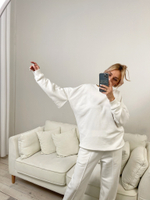 Костюм с разрезами на рукавах