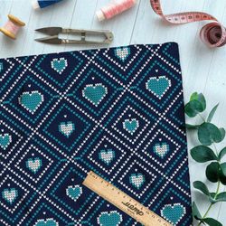 Ткань дюспо сердечки в ромбах на синем свитере
