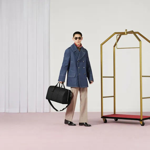 Маленькая сумка Gucci Duffle с орнаментом Jumbo Gg