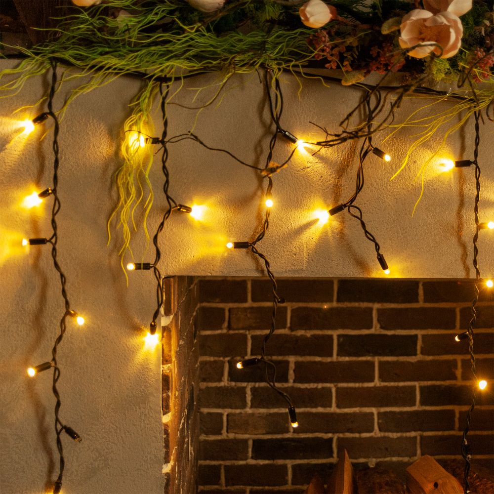 ULD-B5007-300-TBK WARM WHITE IP67 Бахрома светодиодная с эффектом мерцания. 5м. Соединяемая. 300 светодиодов. Теплый белый свет. Провод черный. TM Uniel