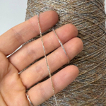 ATLAS - Ri.Go, 68% меринос, 12% люрекс, 20 % п/а; 360м/100гр; шнурок; col.22135, цвет: бежево-голубой меланж с золотым люрексом; Есть бобинка: 75 гр