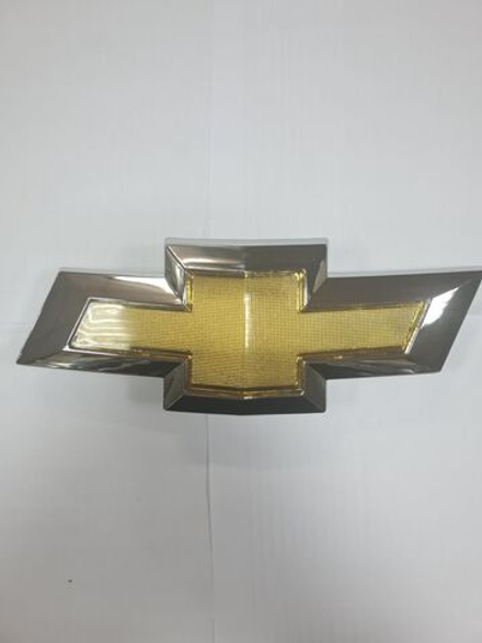 Эмблема передняя Шевроле Кобальт желтая