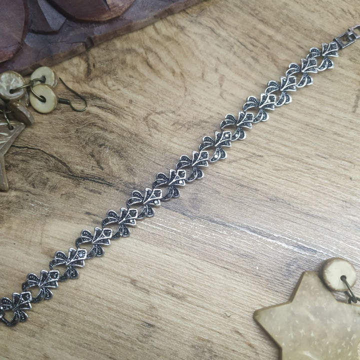 Браслет Vogue 2 Бантик стразы графитовые металл серебристый