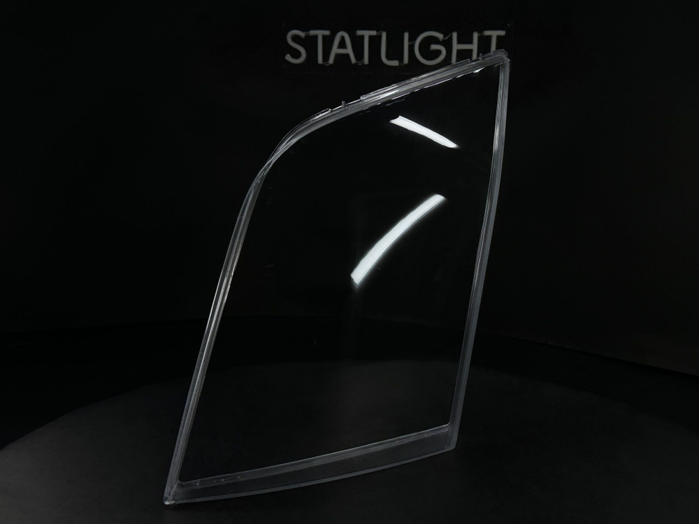 Левое стекло фары Ford Transit 2008-2012