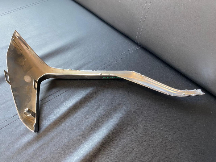 Молдинг заднего бампера левый Geely Monjaro 21-нв