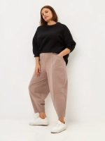 Брюки бананы трикотажные с декоративными швами пудровый