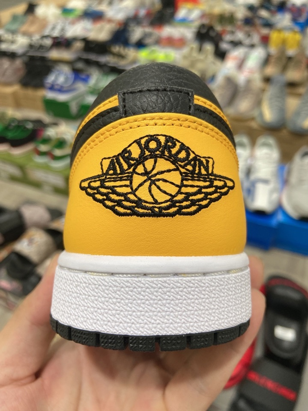 Jordan 1 Low University Gold