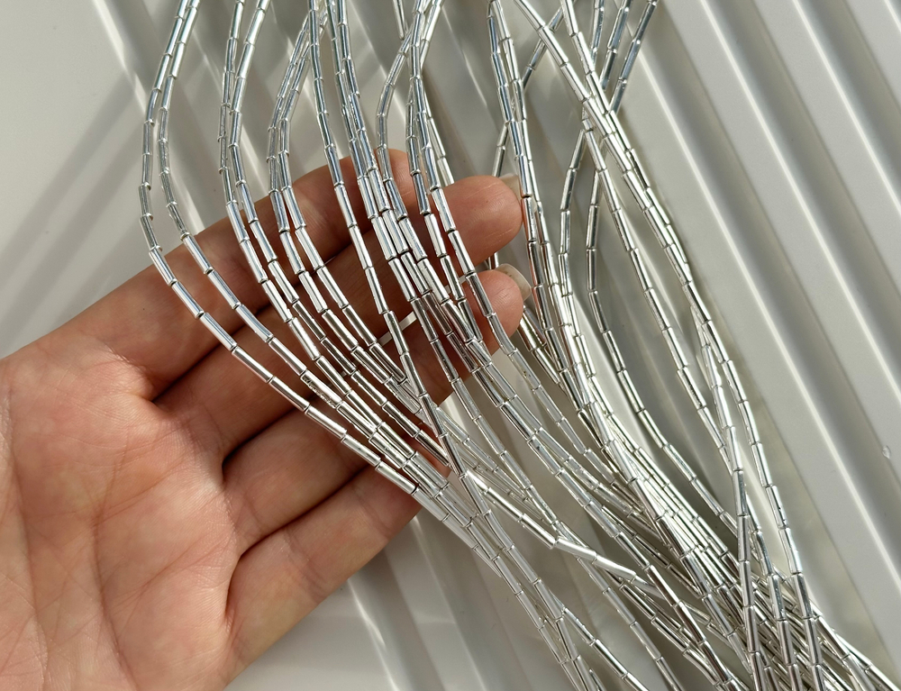 Нить гематитовых бусин "Трубочки" 2х8мм (уценка)